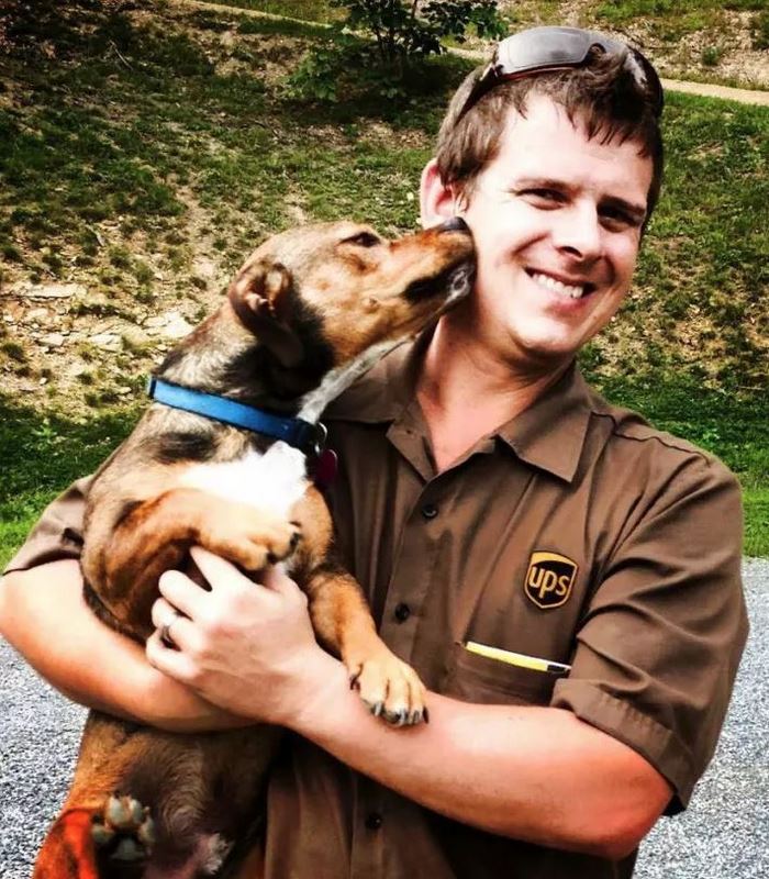Turns Out, UPS Drivers Have A Facebook Group About Dogs They Meet On Their Routes, And It Will Make Your Day