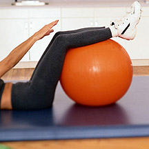 Person exercising with a Swiss ball
