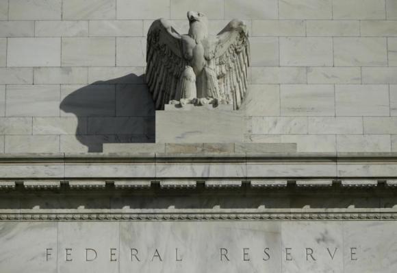A detail from the front of the United States Federal Reserve Board building is shown in Washington October 28, 2014.  REUTERS/Gary Cameron