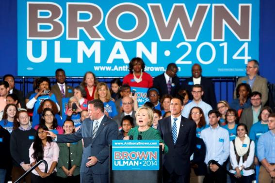 Hillary Clinton makes remarks at a campaign rally for Lieutenant Governor Anthony Brown (R), Democratic nominee for Maryland governor, and Ken Ulman (L), Democratic nominee for Lt. Governor, at the University of Maryland in College Park, Maryland October 30, 2014.  REUTERS/Jonathan Ernst