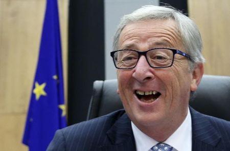 The European Commission&#39;s new President Juncker reacts as he chairs the first official meeting of the EU&#39;s executive body in Brussels