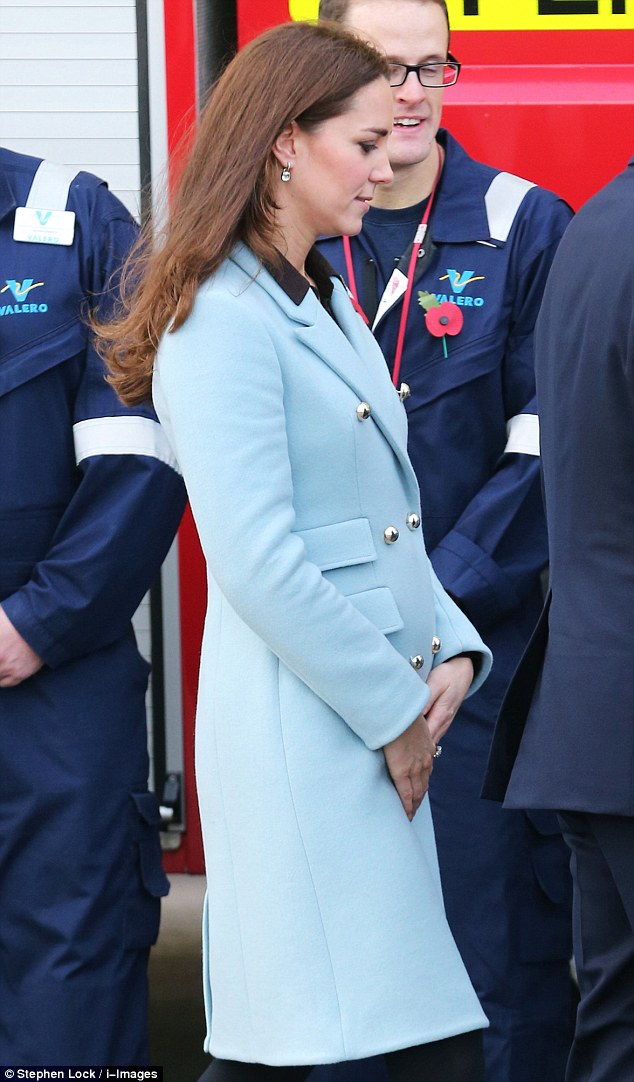 The Duchess of Cambridge's baby bump could be seen clearly through her coat during the royal visit 