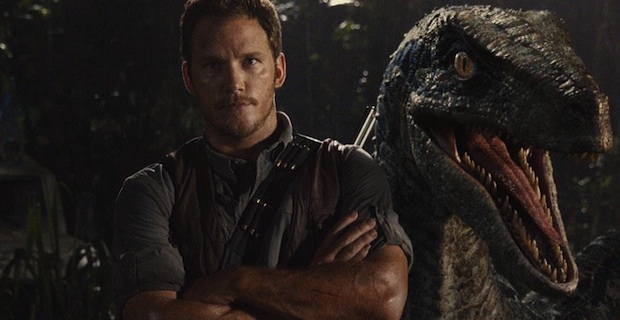 Jurassic World New Image Raptor Photobombs Chris Pratt New Jurassic World Image: Raptor Photobombs Chris Pratt