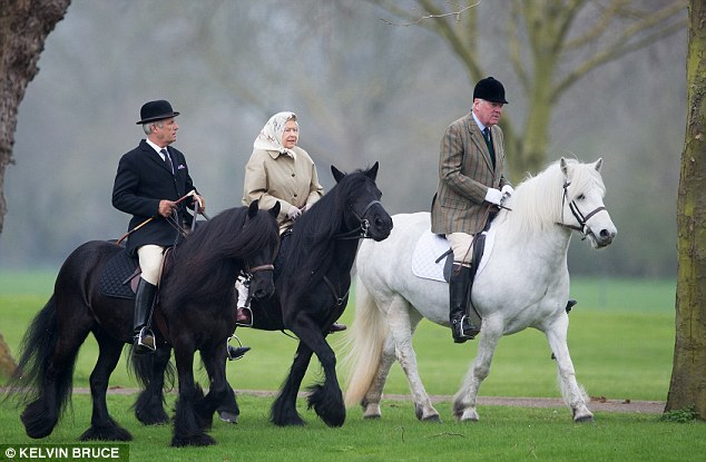 Park life: The Queen was joined by Lord Vestey and her Head Groom Terry Pendry