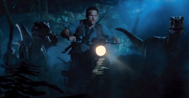 Jurassic World Raptor Bike Chase New Jurassic World Image: Raptor Photobombs Chris Pratt