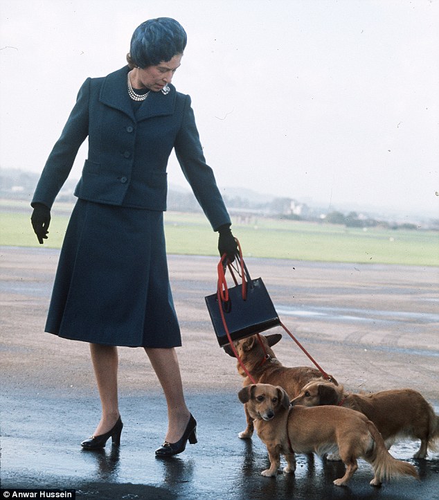 Queen Elizabeth arrives at Aberdeen Airport with her Corgis to start her holidays in Balmoral in 1974