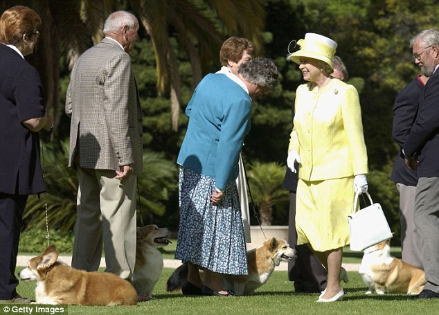 Queen Elizabeth meets members of the Adelaide Hills Kennel Club and their Corgis during a trip in 2002