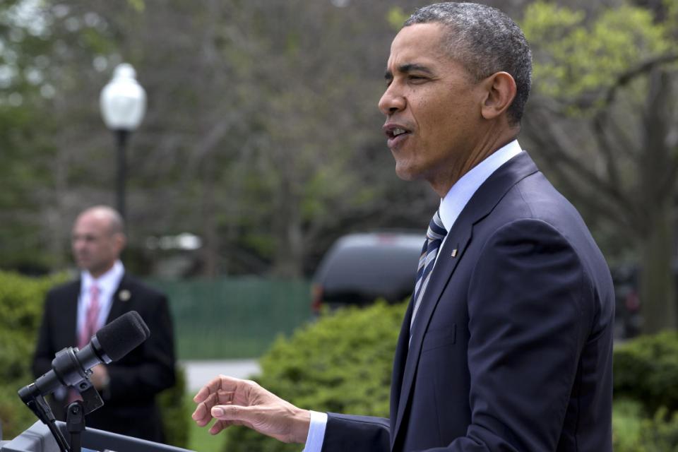 In this April 18, 2014 file photo, President Barack Obama speaks in the Rose Garden of the White House in Washington. House Speaker John  Boehner of...