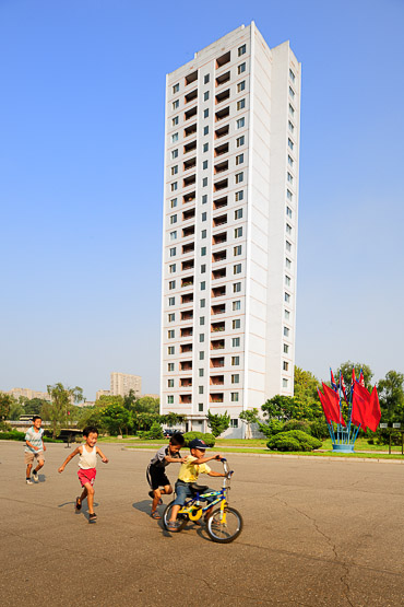 kids playing in the street in Pyongyang 
