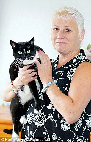 When Susan Marsh-Armstrong, 51, fell unconscious, her cat Charley got help
