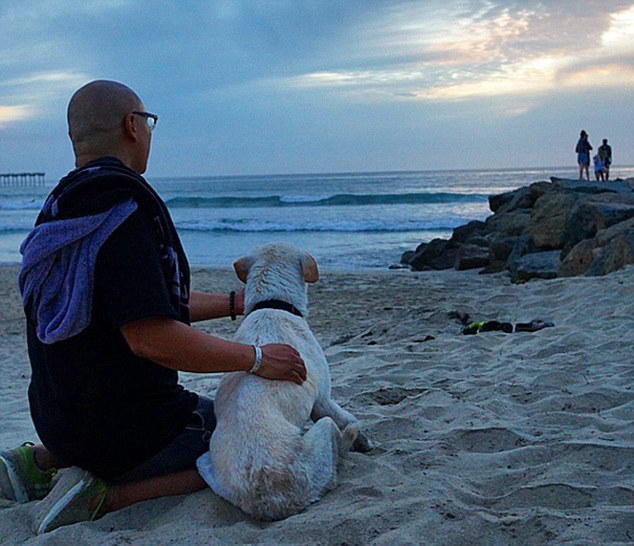 Heart-wrenching: However, they were recently forced to return home after 15-year-old Poh became too ill to continue traveling. Above, Mr Rodriguez and Poh are pictured watching the sun set on a California beach
