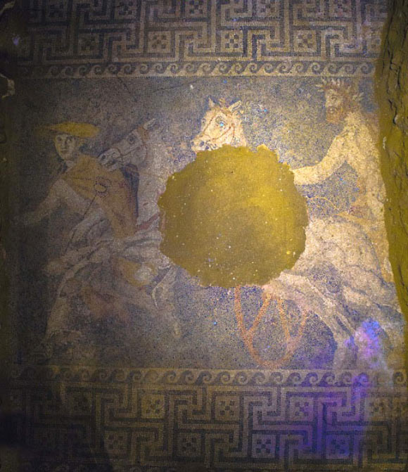 The mosaic depicts the Greek god Hermes in front of a horse drawn chariot. Image credit: Greek Culture Ministry.