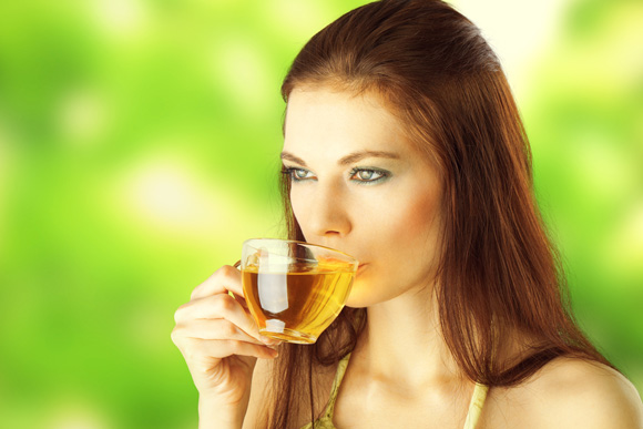 Young Female Drinking Green Tea