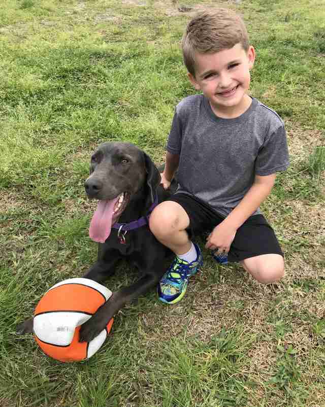First grader Travis with his rescue dog Rosie