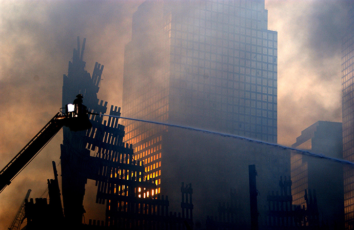 Firemen continue to fight the fires that sprout up from within the rubble of the World Trade Center September 19, 2001. (Reuters / PA2 Tom)