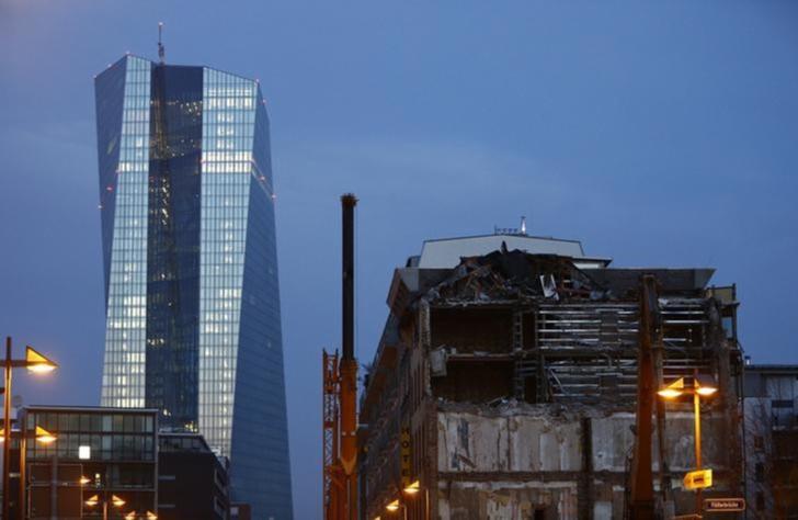 The new European Central Bank (ECB) headquarters are pictured behind partially dismantled Sudfass brothel club in Frankfurt