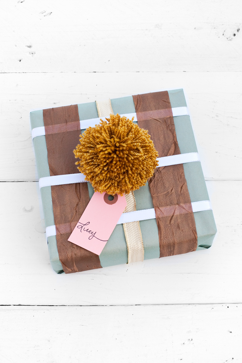 Use scrap pieces of ribbon to make a plaid design on your wrapped gifts.