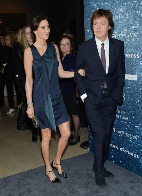 FILE - In this Nov. 13, 2014 file photo, Sir Paul McCartney and wife Nancy Shevell arrive at "An Evening Honoring Stella McCartney" presented by American Express, benefiting the Lincoln Center Corporate Fund, at Alice Tully Hall in New York. McCartney is 72, and only the wrinkles give his years away. He's so young in his thoughts that he will dismiss the idea of a memoir as a project for his 70s, catch himself, and dismiss a book again as if time were still a distant bother. (Photo by Evan Agostini/Invision/AP, File)