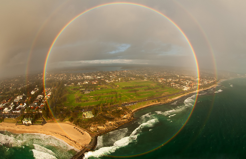 WHEN A RAINBOW GOES FULL CIRCLE  Altitude and good timing led to this rare view of a full-circle double rainbow.