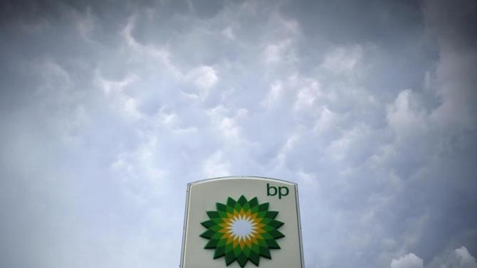 Storm clouds form near a BP station in Alexandria, Virginia