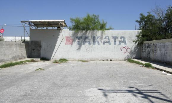 A logo of Takata, the world's second-largest supplier of airbags and seatbelts, is seen at its former factory near Monclova in this July 28, 2014 file photo. REUTERS/Joanna Zuckerman Bernstein/Files